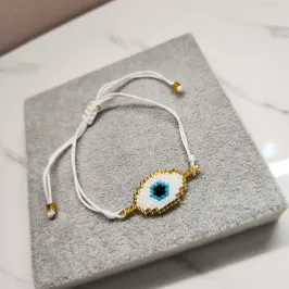 PULSEIRA OURO OLHO BRANCO