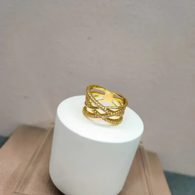 ANEL OURO ENTRELAÇADO ZIRC