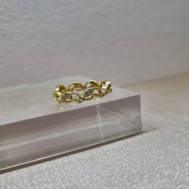 ANEL OURO FOLHAS ZIRC