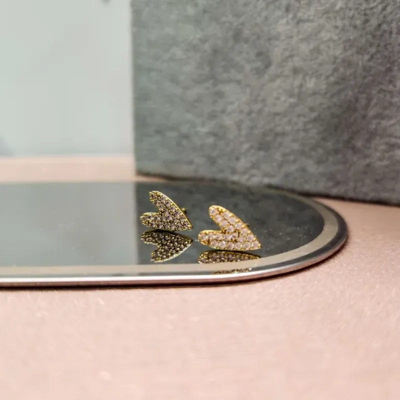 BRINCO OURO CORAÇÃO TORTO