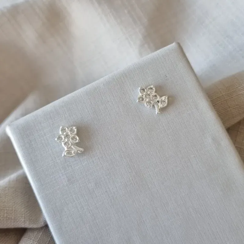 BRINCO PRATA FLOR ZIRC CABO