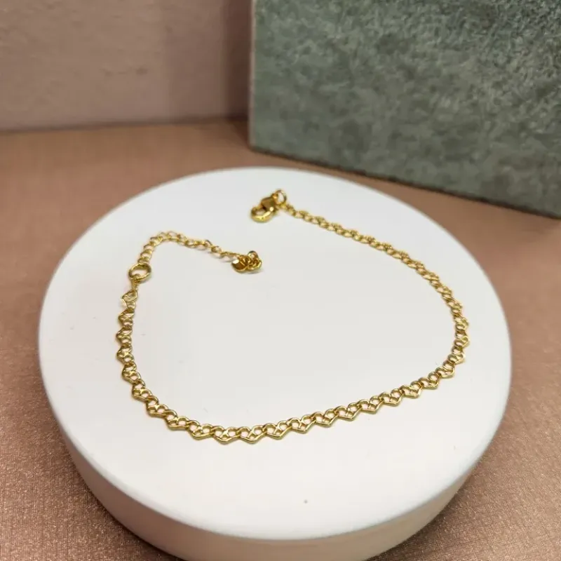 PULSEIRA OURO CORAÇÕES ARABESCO