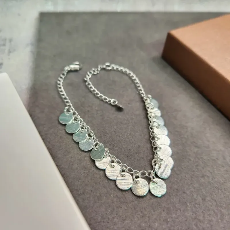 PULSEIRA PRATA PINGENTES DISCO