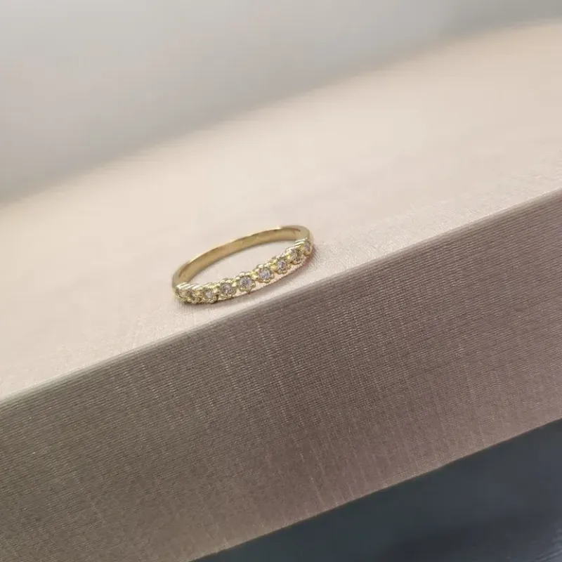 ANEL OURO APARADOR FLOR