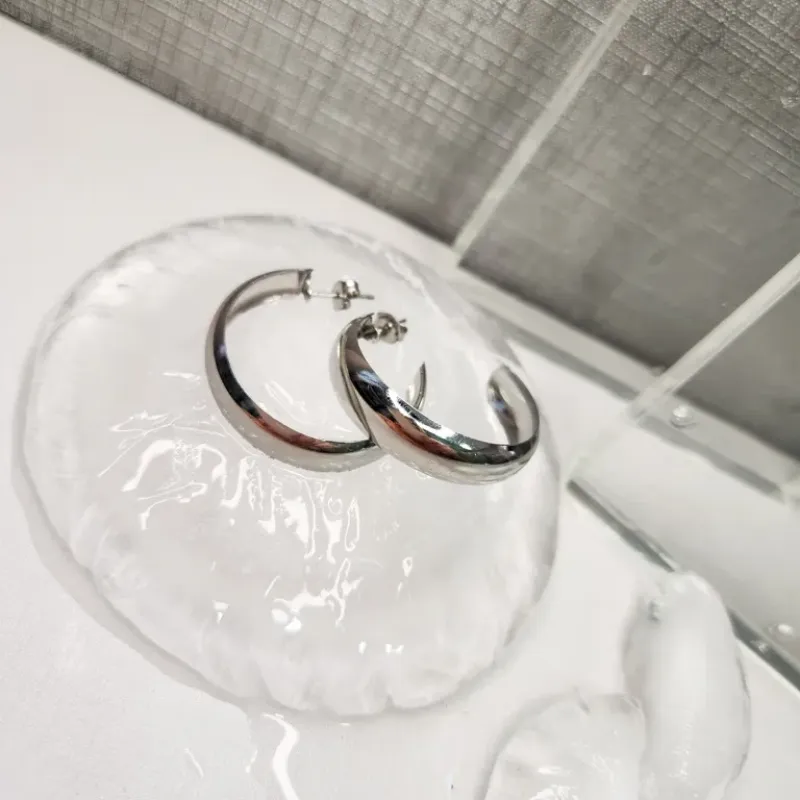 BRINCO ARGOLA AÇO ABAULADA M