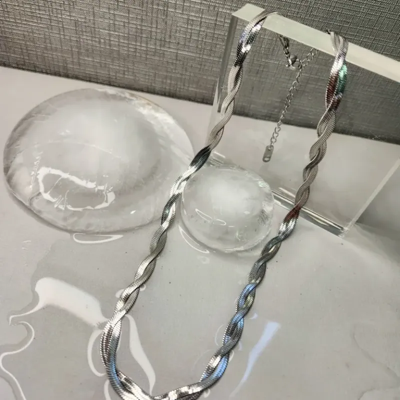 COLAR AÇO ENTRELAÇADO