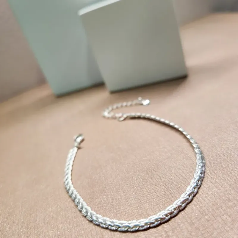 PULSEIRA PRATA TRANÇADA RIGIDA P