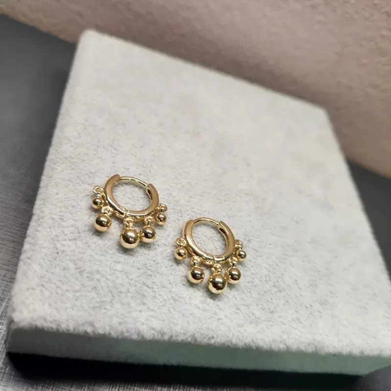 BRINCO OURO TRANQUETA BOLINHAS