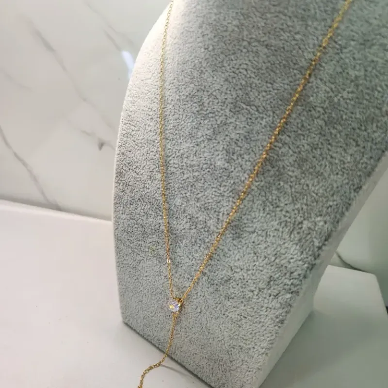 COLAR OURO GRAVATA PONTO DE LUZ