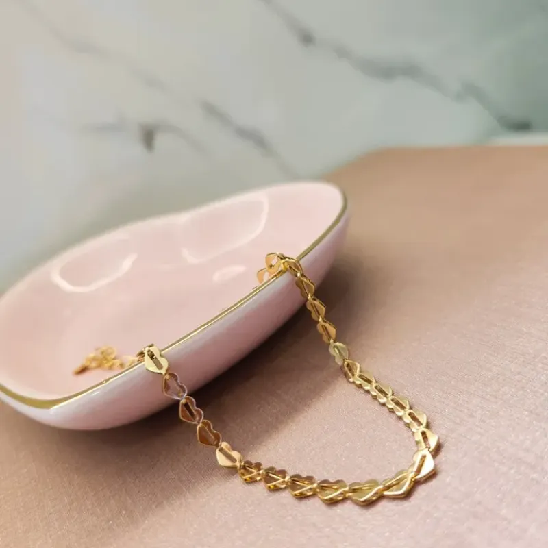 PULSEIRA OURO CORAÇÕES TRAÇO