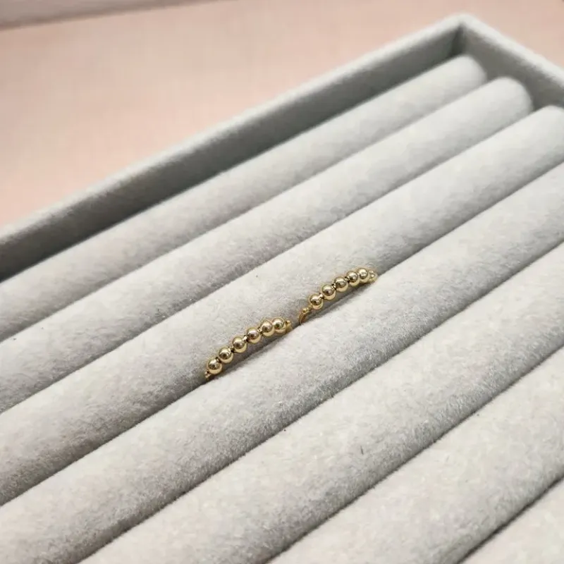 BRINCO OURO BOLINHAS LISAS