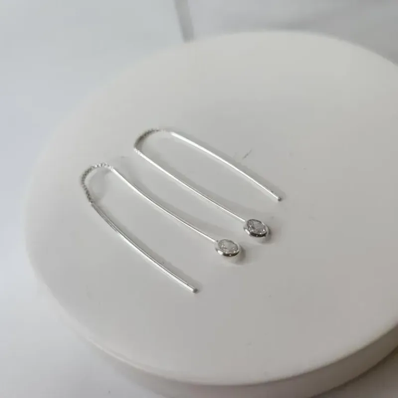 BRINCO PRATA DUAS PONTAS LUZ