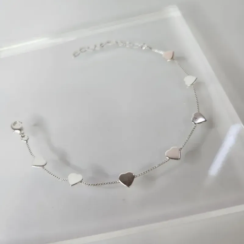 PULSEIRA PRATA CORAÇÕES CHAPADOS