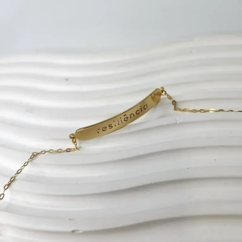 PULSEIRA OURO PLACA RESILIÊNCIA
