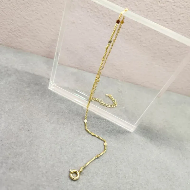 TORNOZELEIRA OURO CORR BOL CHAP