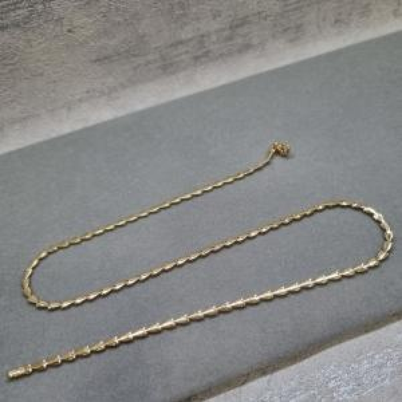 COLAR OURO SETAS	