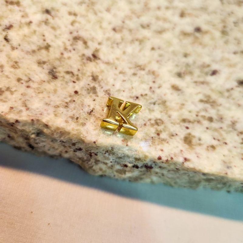Inicial ouro K