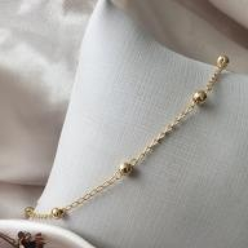 PULSEIRA OURO BOLINHA ESPASSADAS