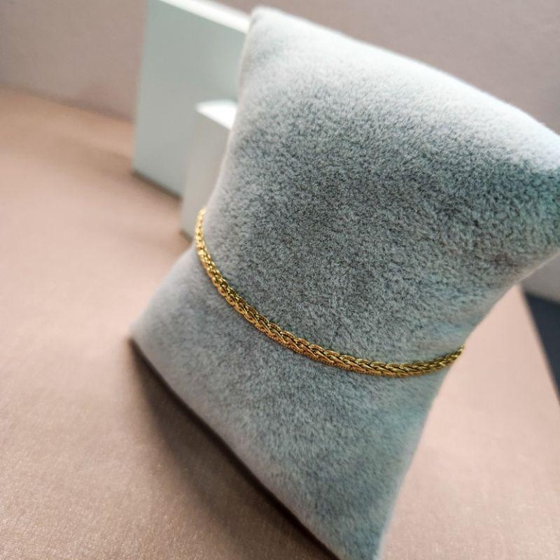 PULSEIRA OURO TRANÇADA RIGIDA P