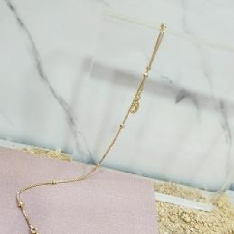 TORNOZELEIRA OURO BOLINHAS