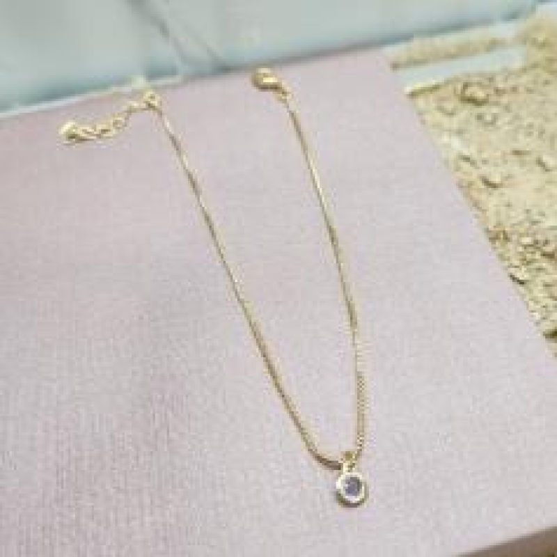 TORNOZELEIRA OURO PONTO DE LUZ