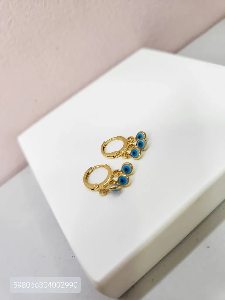 BRINCO ARGOLA OURO TRANQ OLHO