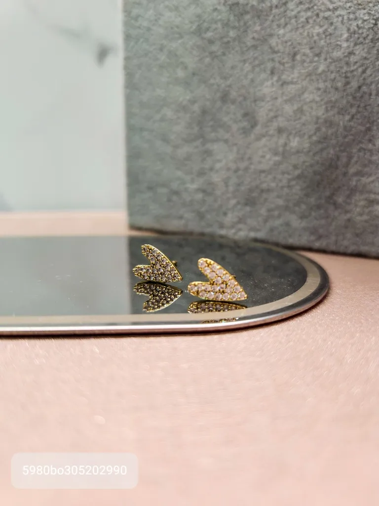 BRINCO OURO CORAÇÃO TORTO