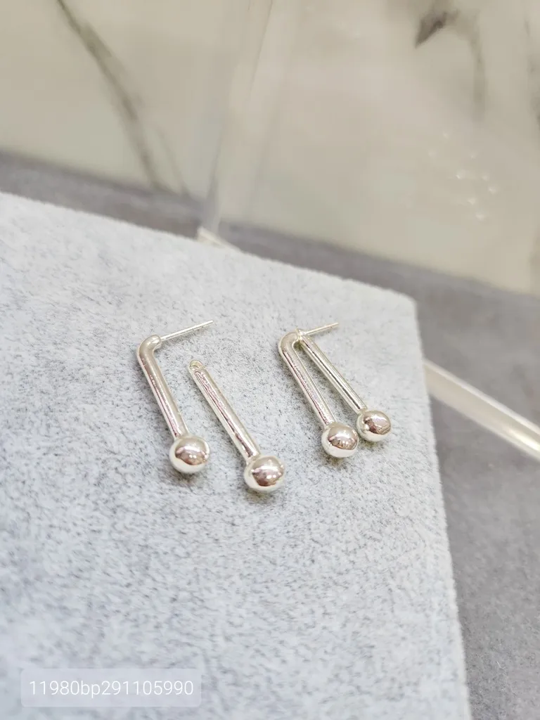 BRINCO PRATA DOIS PINOS BOLA