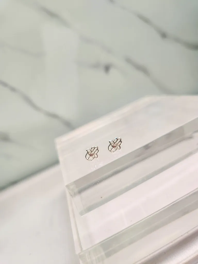 BRINCO PRATA HAMSA V