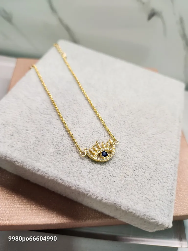 PULSEIRA OURO OLHO ZIRC