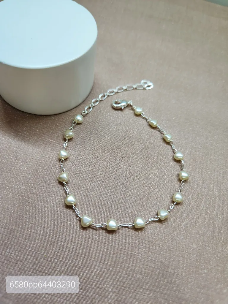 PULSEIRA PRATA CORAÇÃO PEROLA