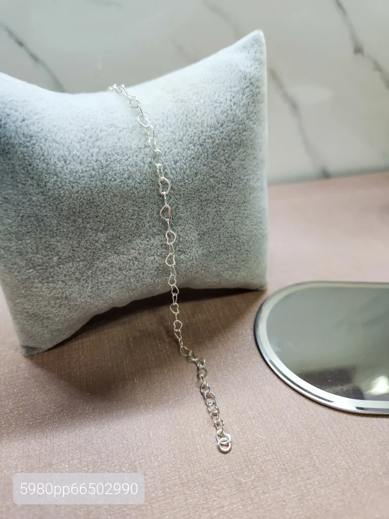 PULSEIRA PRATA CORAÇÃO VAZADO