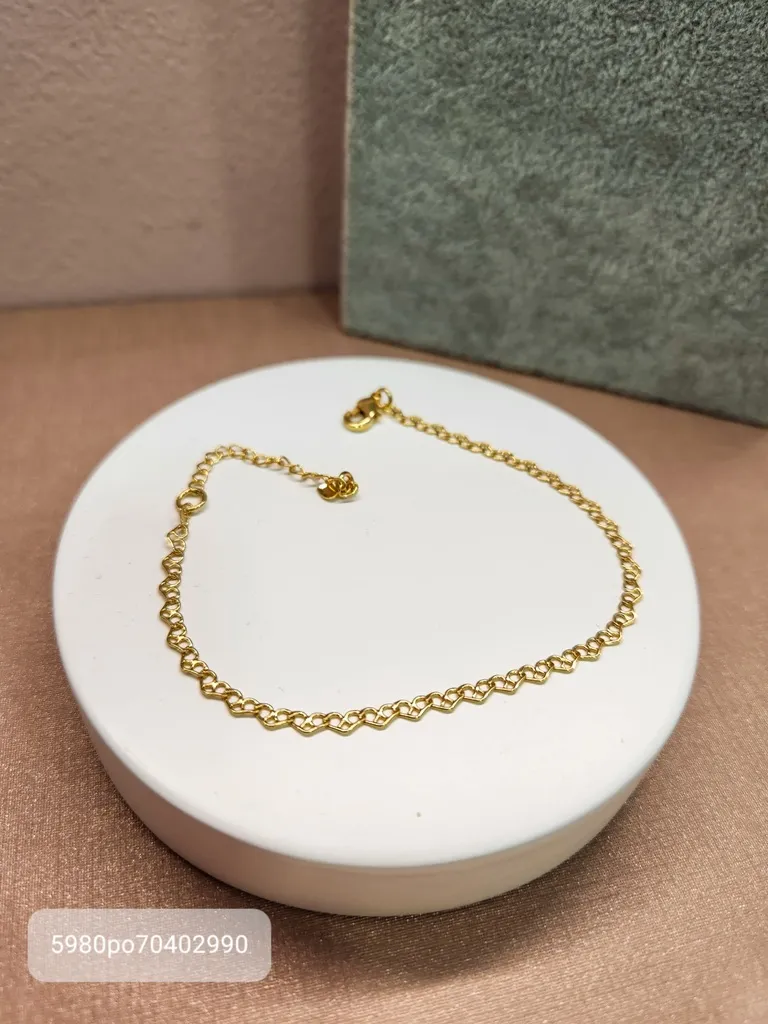 PULSEIRA OURO CORAÇÕES ARABESCO