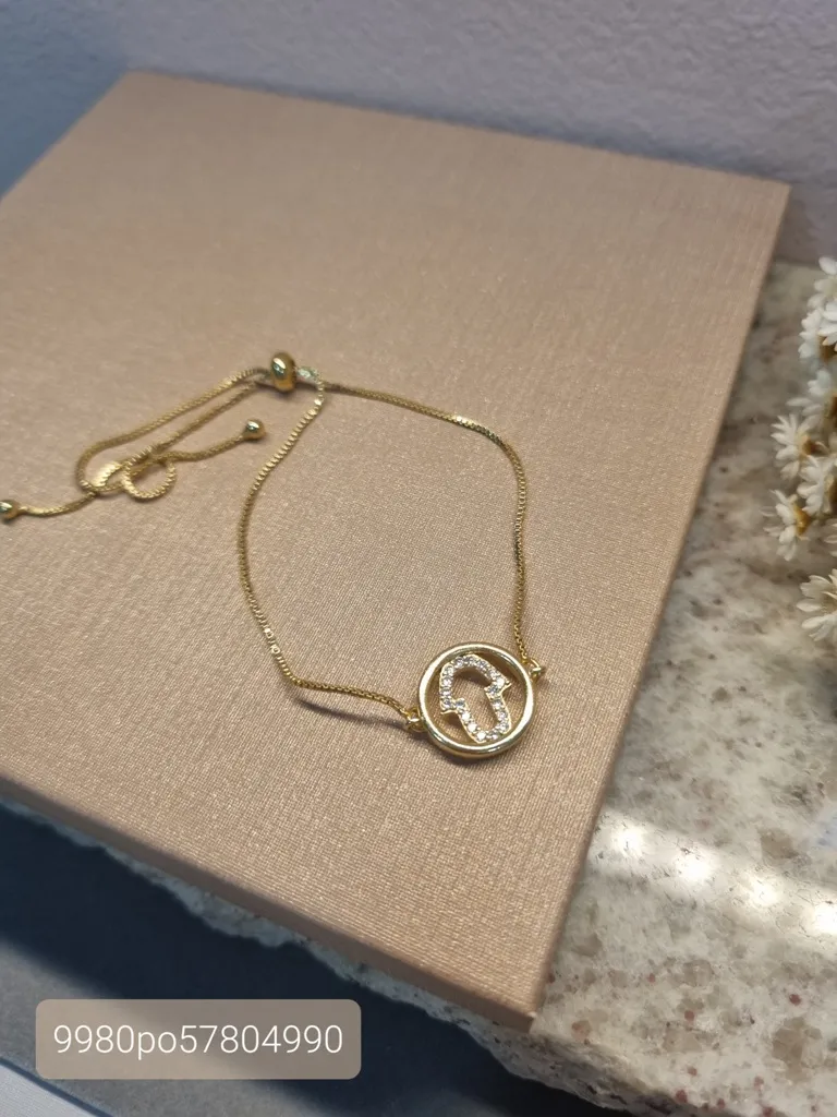 PULSEIRA OURO HAMSÁ VAZADA ZIRC