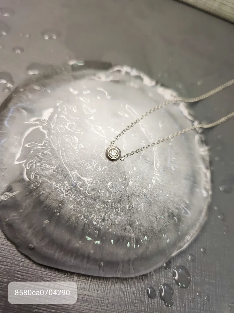 COLAR AÇO PONTO DE LUZ