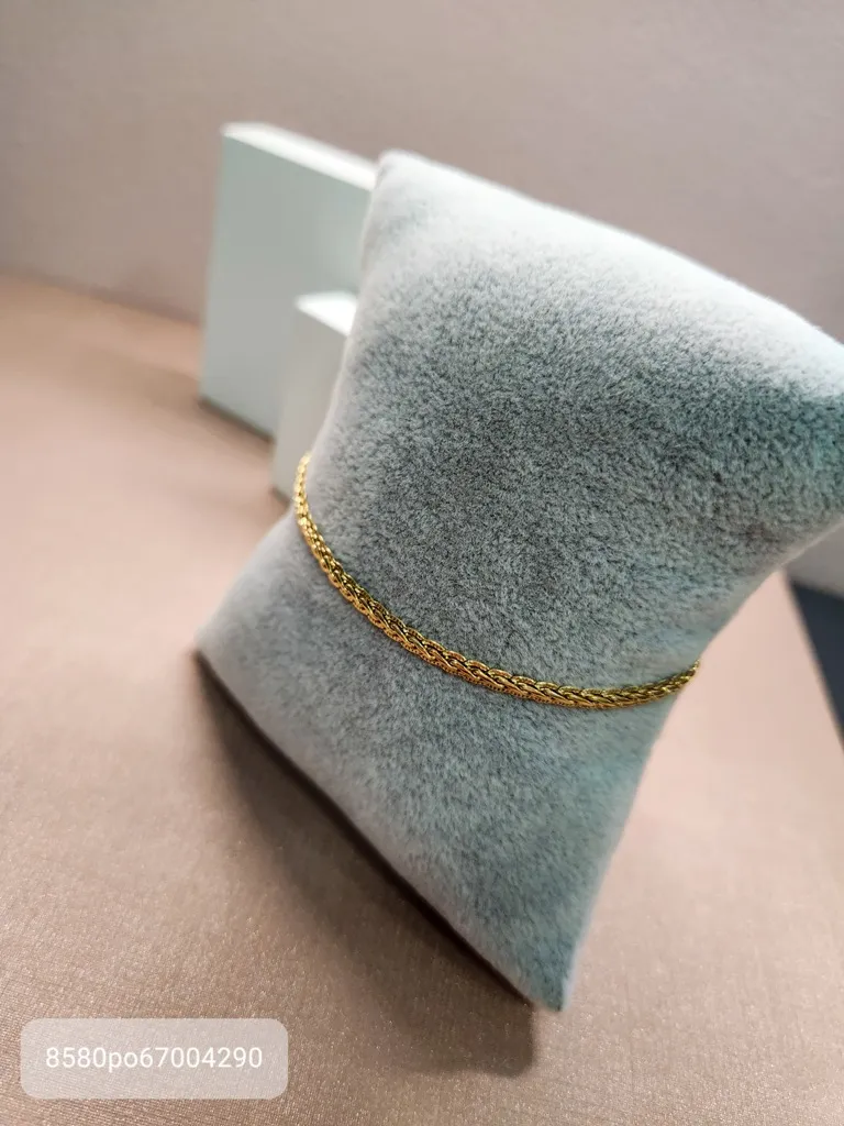 PULSEIRA OURO TRANÇADA RIGIDA P