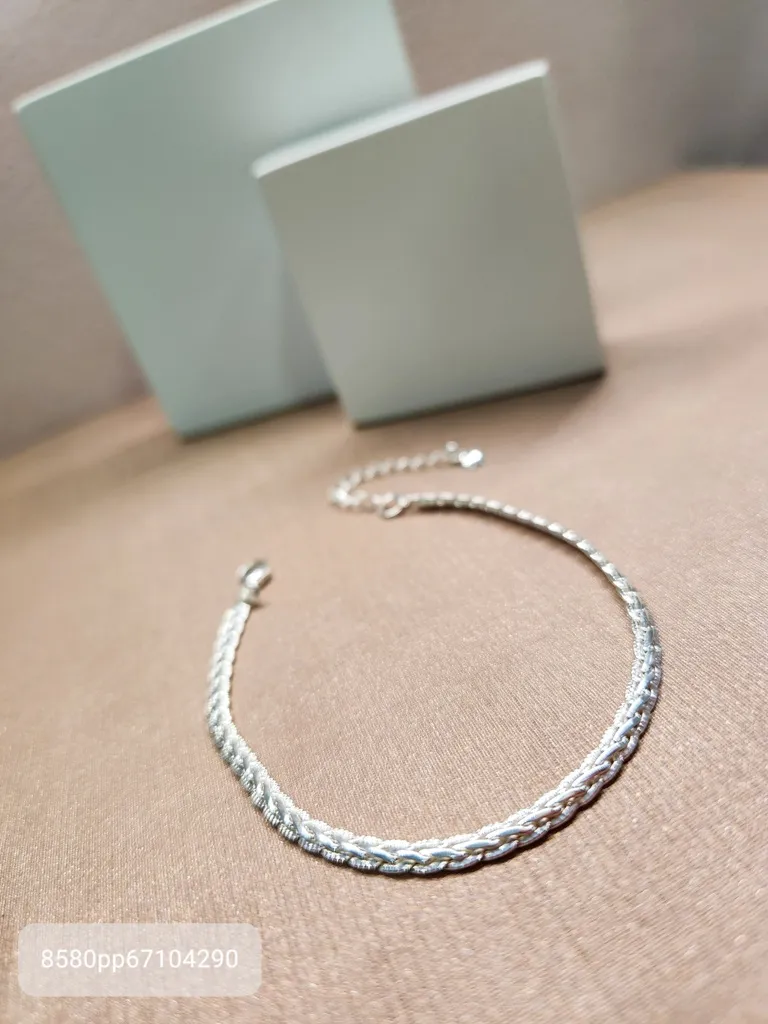 PULSEIRA PRATA TRANÇADA RIGIDA P