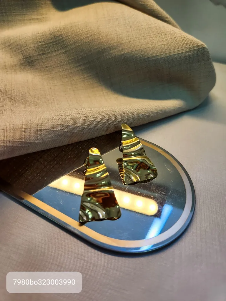 BRINCO OURO ORGANICO TRIANG