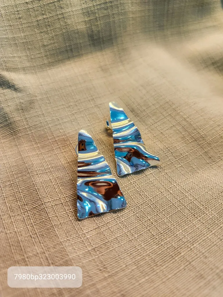 BRINCO PRATA ORGANICO TRIANG