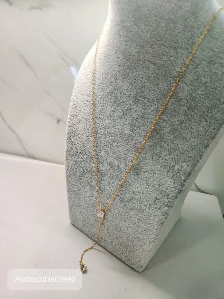 COLAR OURO GRAVATA PONTO DE LUZ