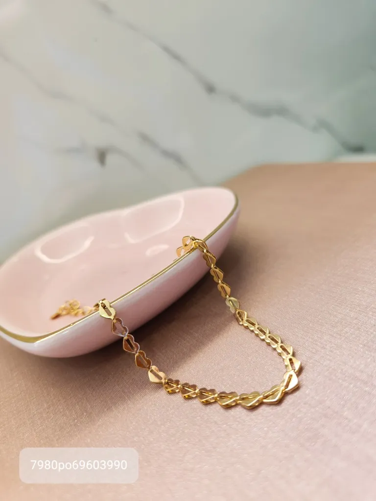 PULSEIRA OURO CORAÇÕES TRAÇO