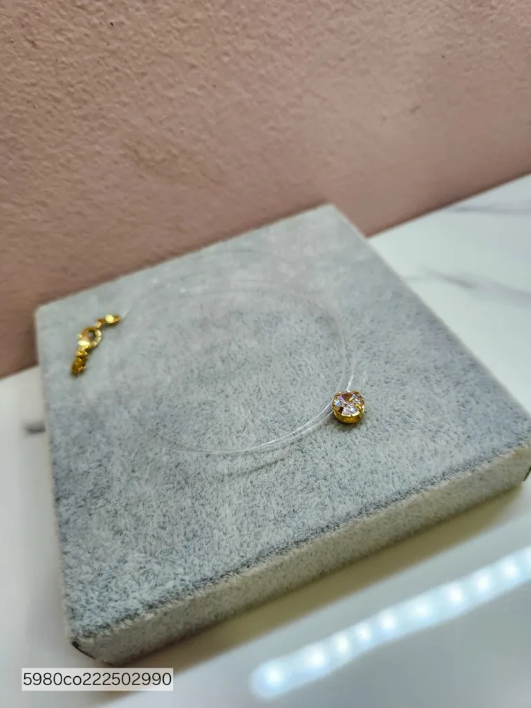 COLAR INVISÍVEL PONTO DE LUZ OURO