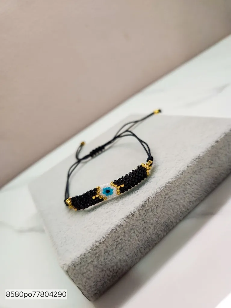 PULSEIRA OURO OLHO PRETO