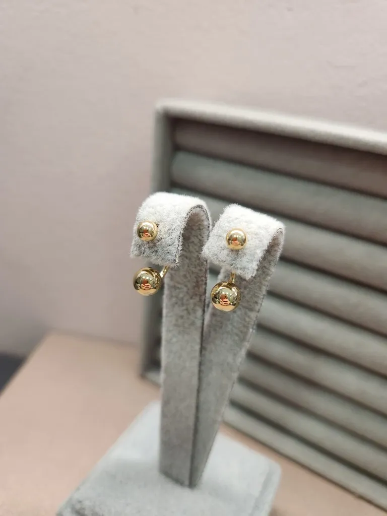 BRINCO OURO 2 EM1 BOLAS