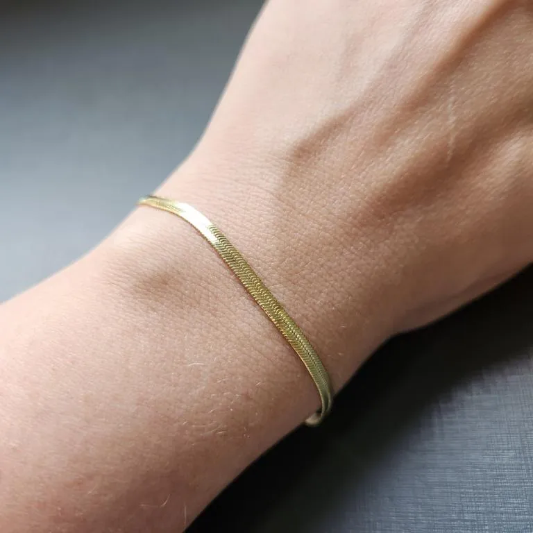 PULSEIRA OURO FITA CHAPADA