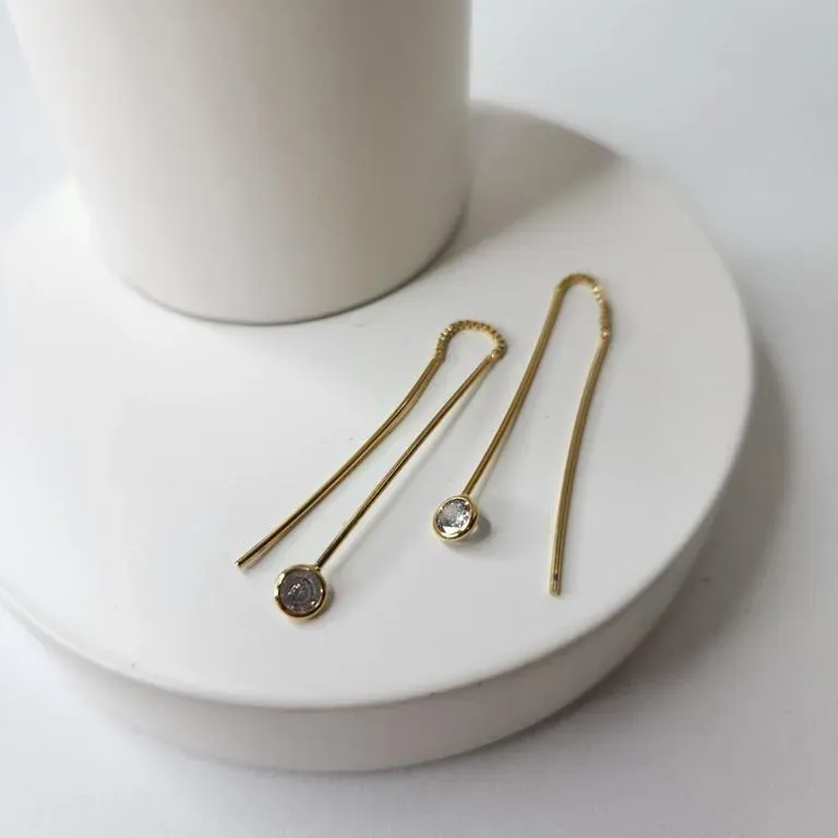 BRINCO OURO DUAS PONTAS LUZ