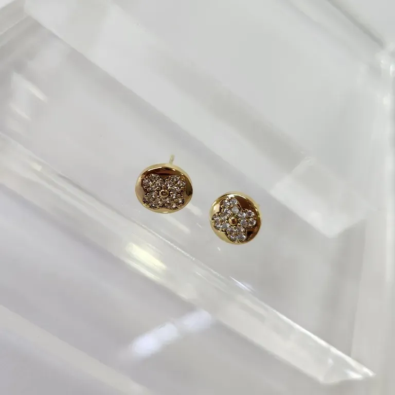 BRINCO OURO FLOR ZIR M