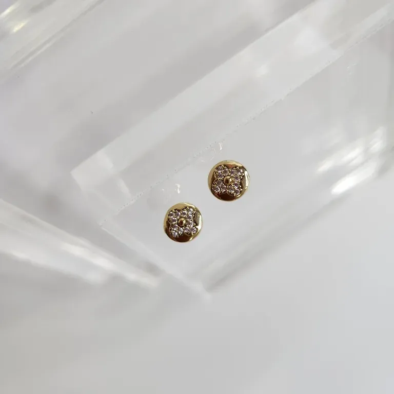 BRINCO OURO FLOR ZIR P