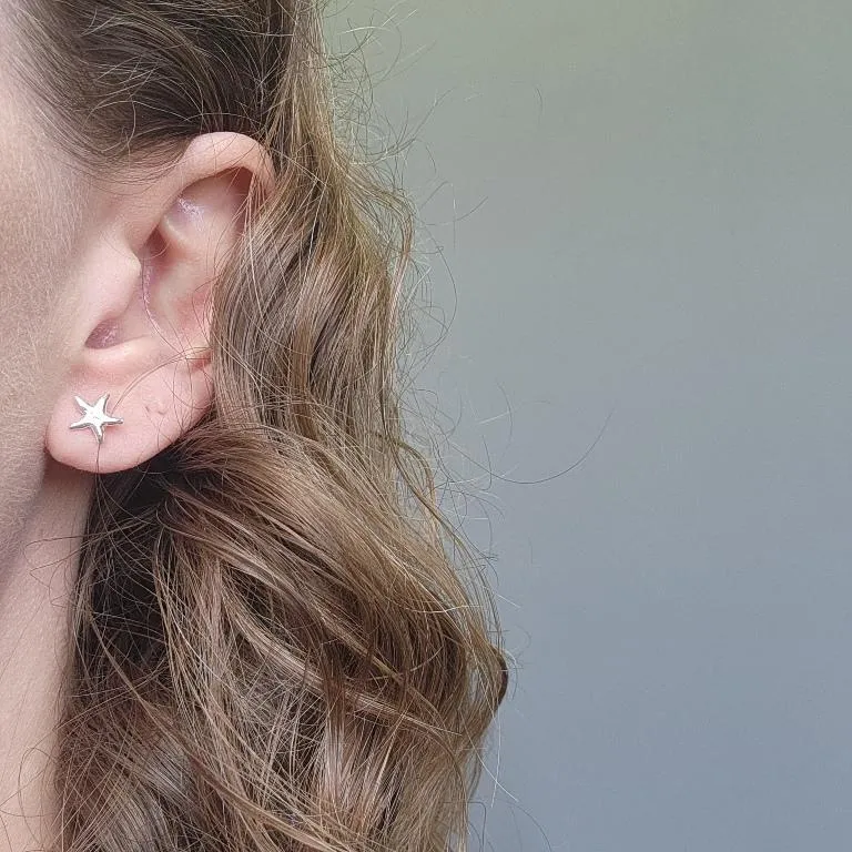 BRINCO PRATA ESTRELA DO MAR