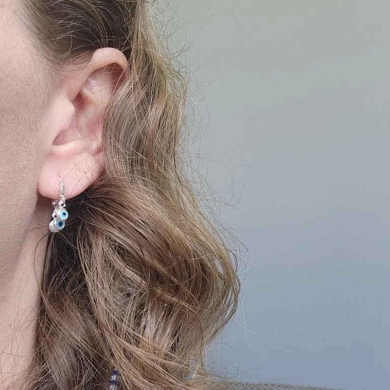 BRINCO PRATA 3 OLHO GREGO